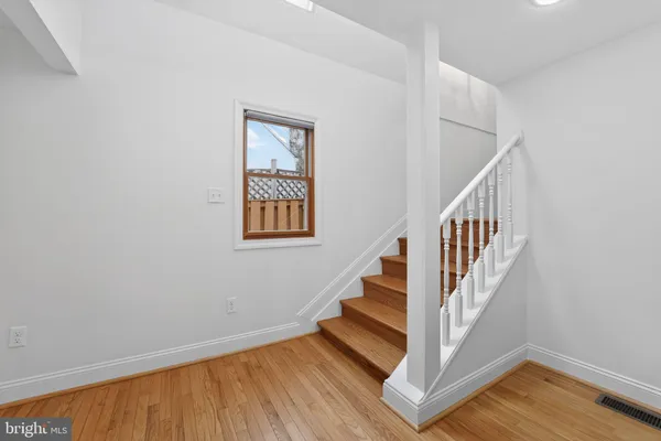 a view of entryway with wooden floor