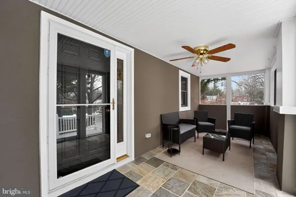 a view of a livingroom with furniture and window