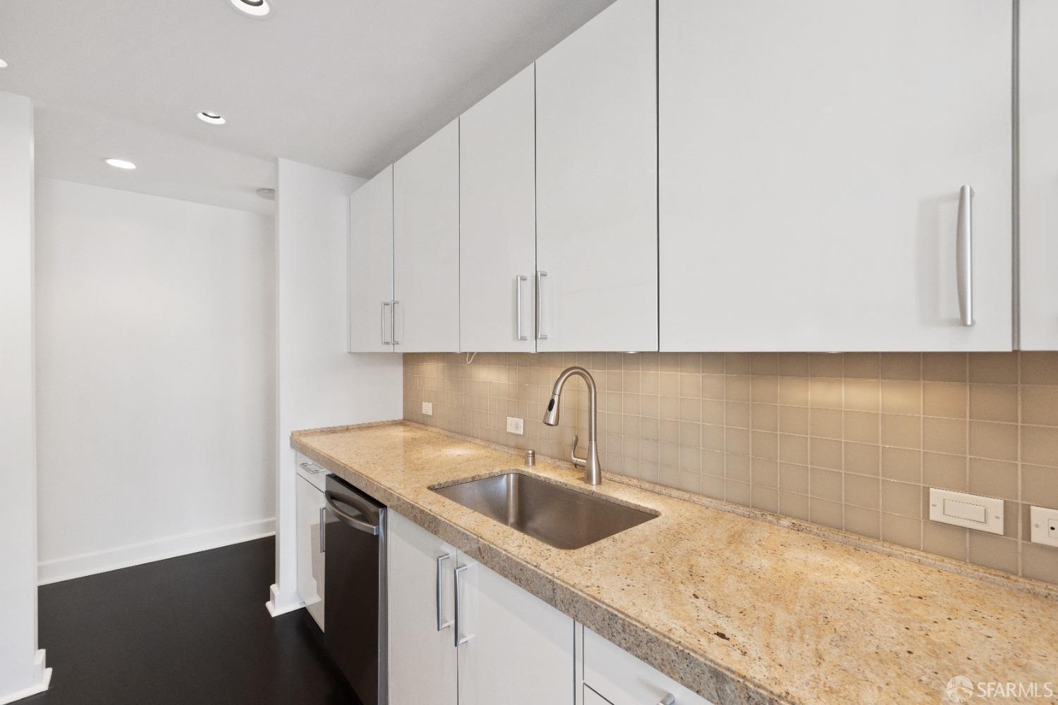 188 Minna, Unit 33A San Francisco, CA 94105 - Photo 11 of 29 a kitchen with a sink cabinets and utility