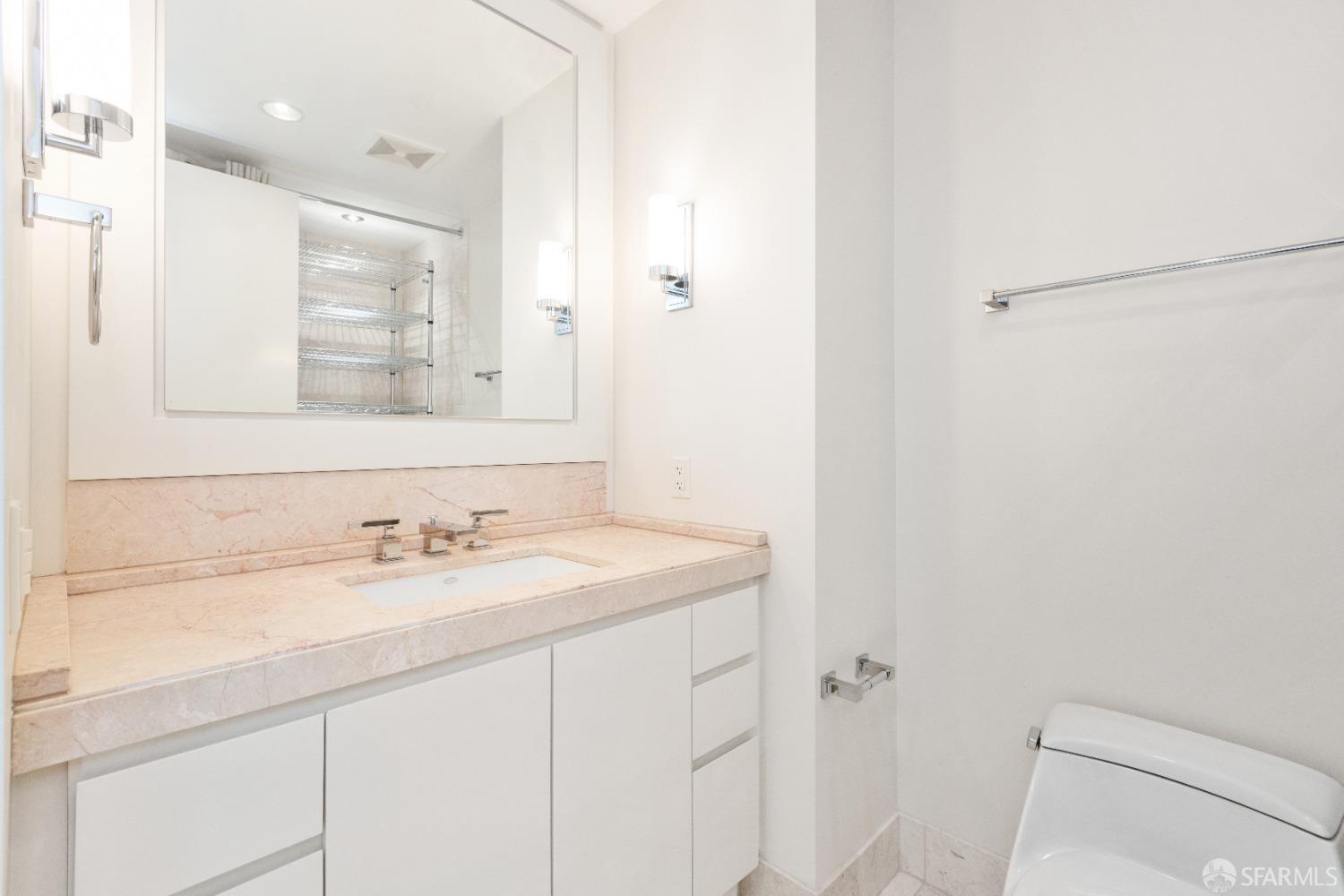 188 Minna, Unit 33A San Francisco, CA 94105 - Photo 12 of 29 a bathroom with a sink and a mirror