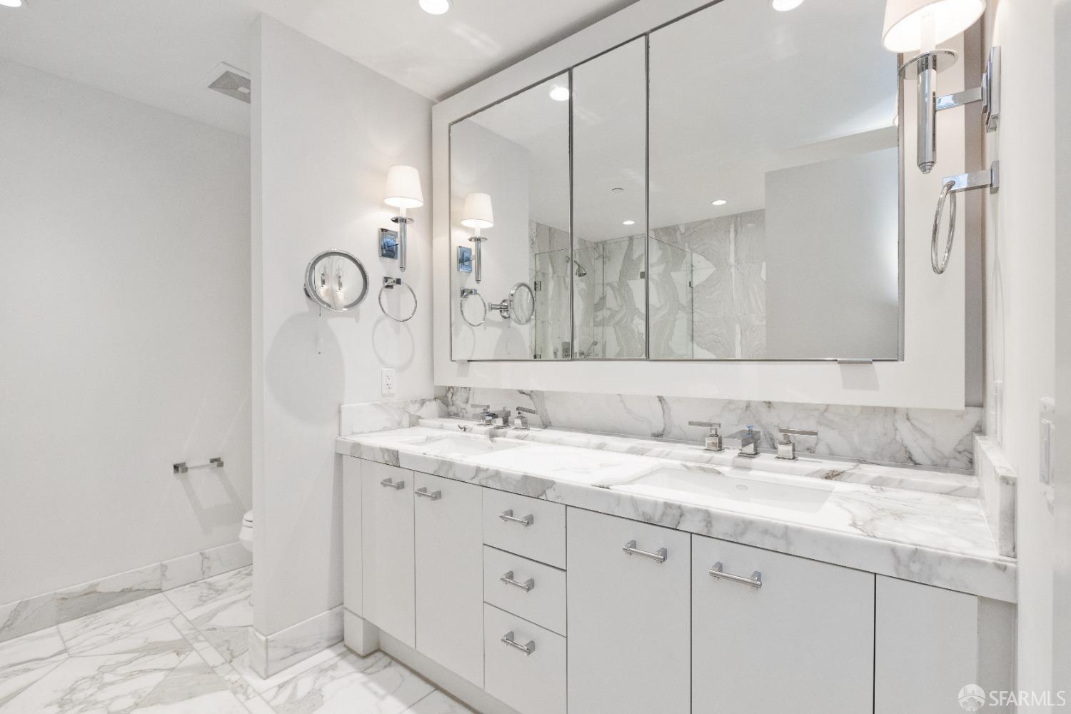 188 Minna, Unit 33A San Francisco, CA 94105 - Photo 16 of 29 a bathroom with a sink and a mirror