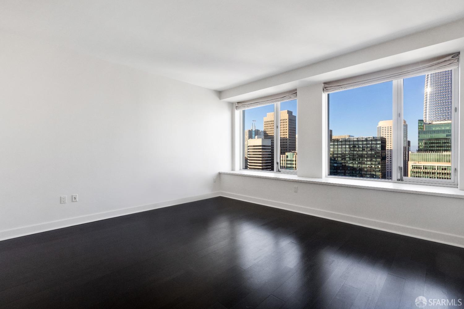 188 Minna, Unit 33A San Francisco, CA 94105 - Photo 4 of 29 wooden floor in an empty room with a window
