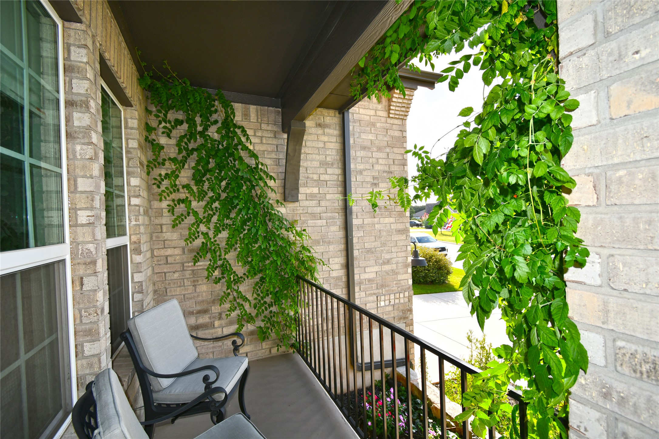 249 Running Bird Road Austin, TX 78737 - Photo 4 of 40 a view of a chair and table in the balcony