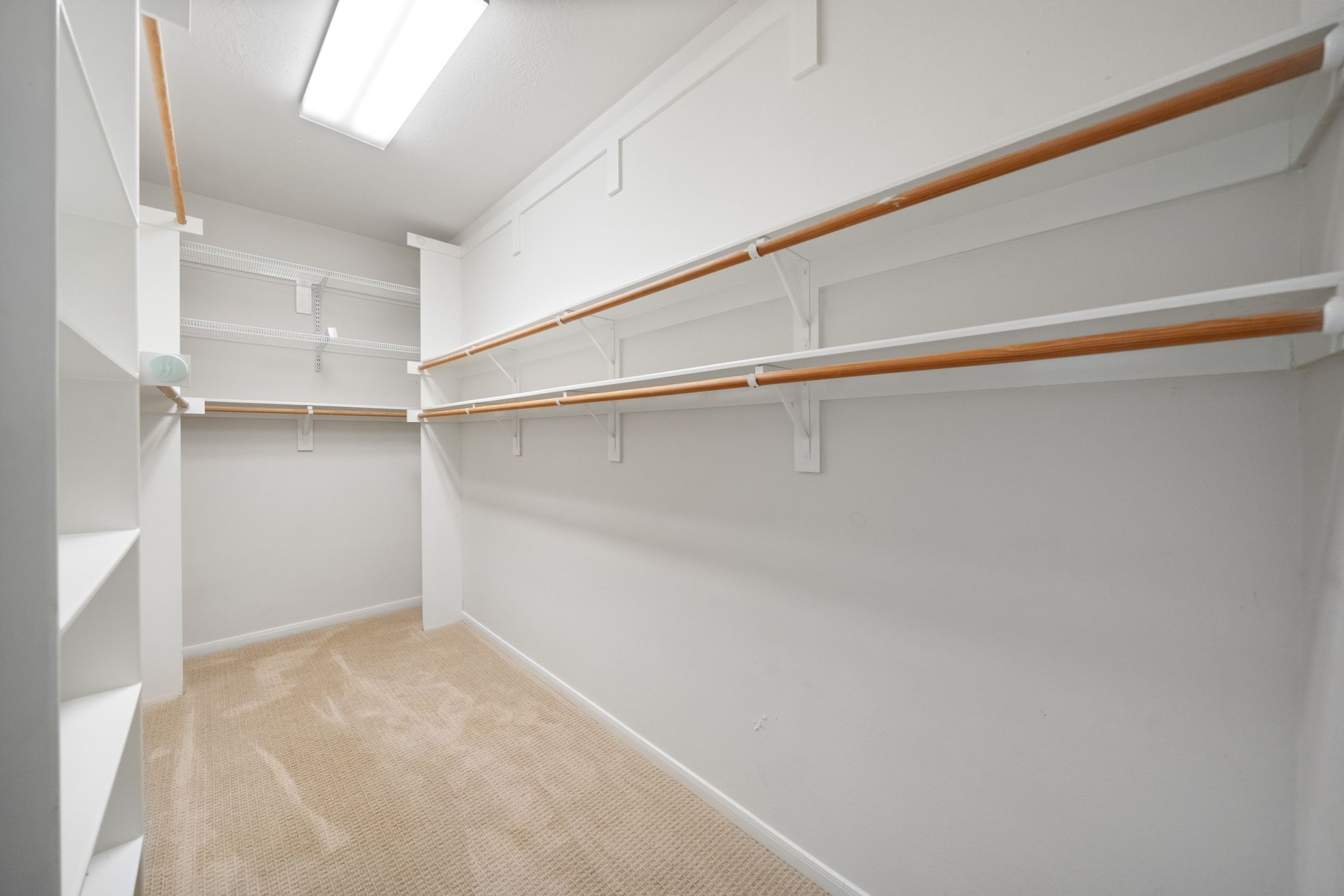 7 Sovereign Way Conroe, TX 77384 - Photo 13 of 31 a view of an empty walk in closet