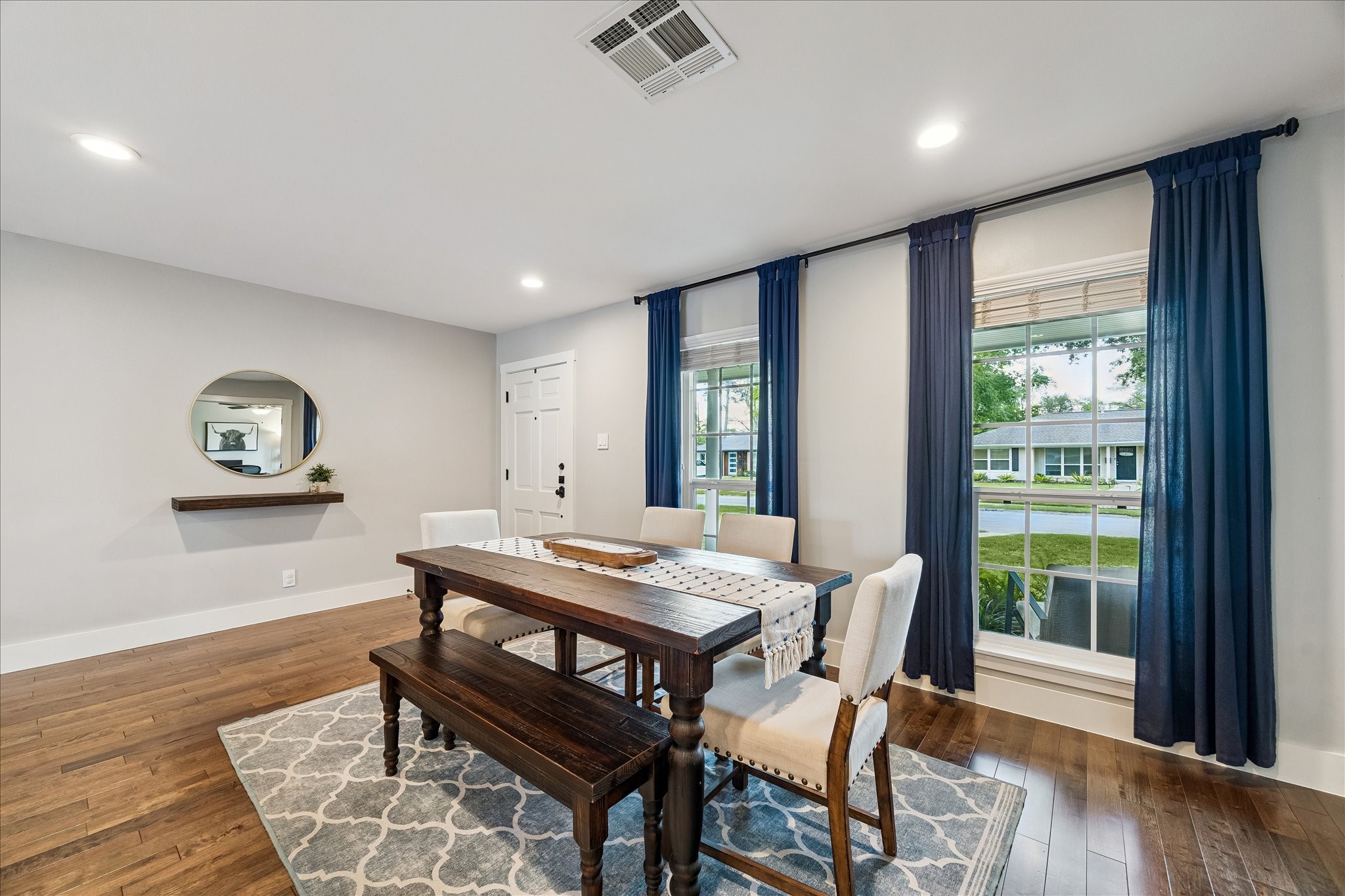 2203 Lamonte Lane Houston, TX 77018 - Photo 4 of 25 a view of a dining room with furniture window and wooden floor