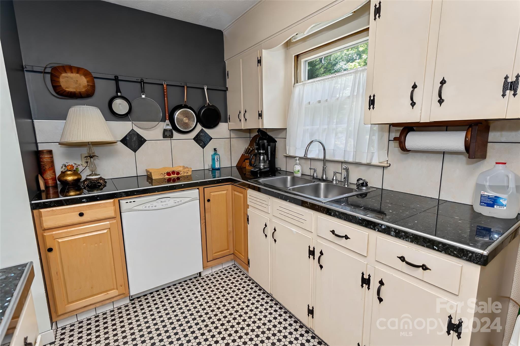 45 Cub Road Asheville, NC 28806 - Photo 12 of 46 a kitchen with granite countertop a sink and a stove