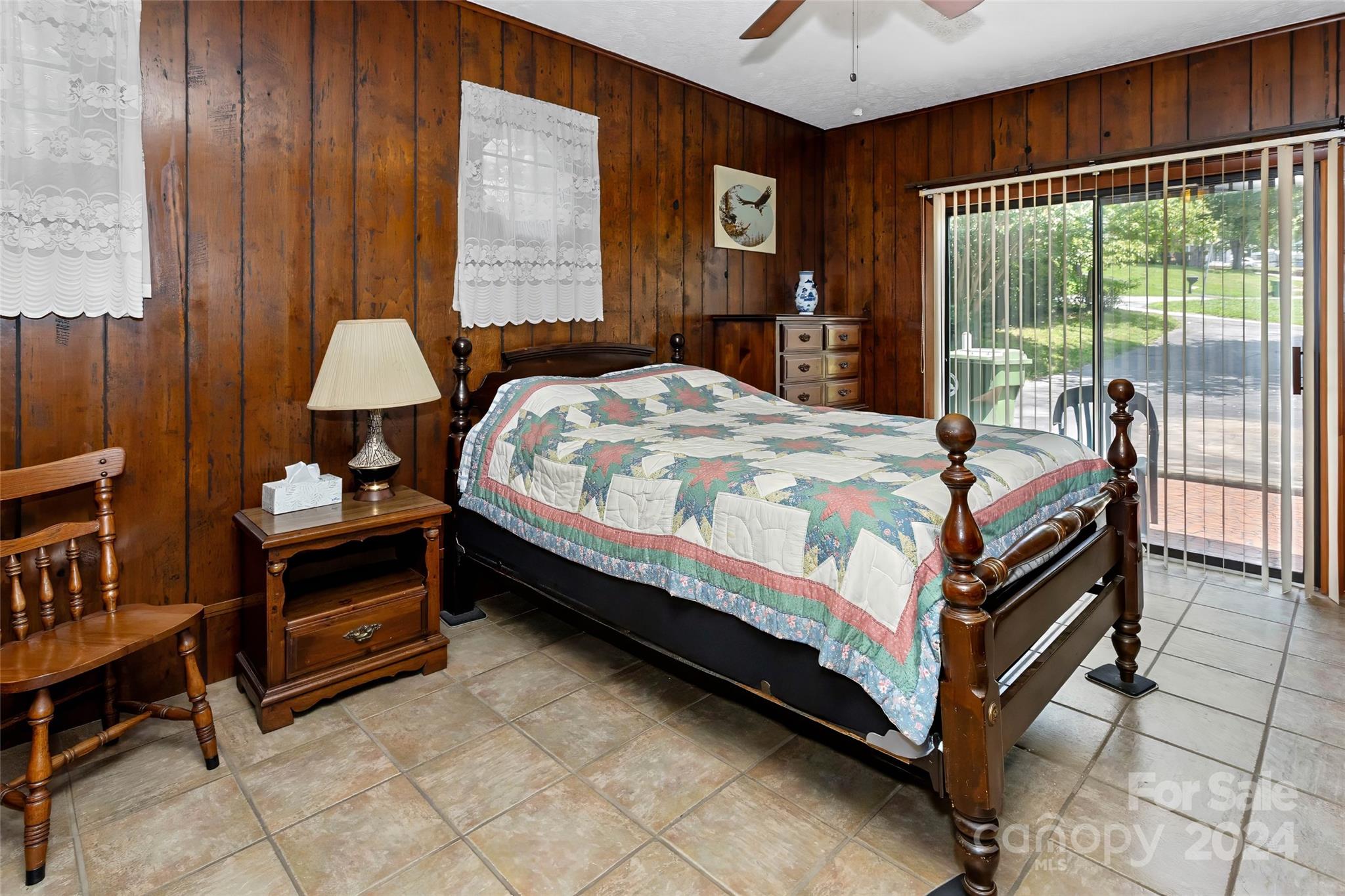 45 Cub Road Asheville, NC 28806 - Photo 14 of 46 a bedroom with a bed and a dresser next to a window