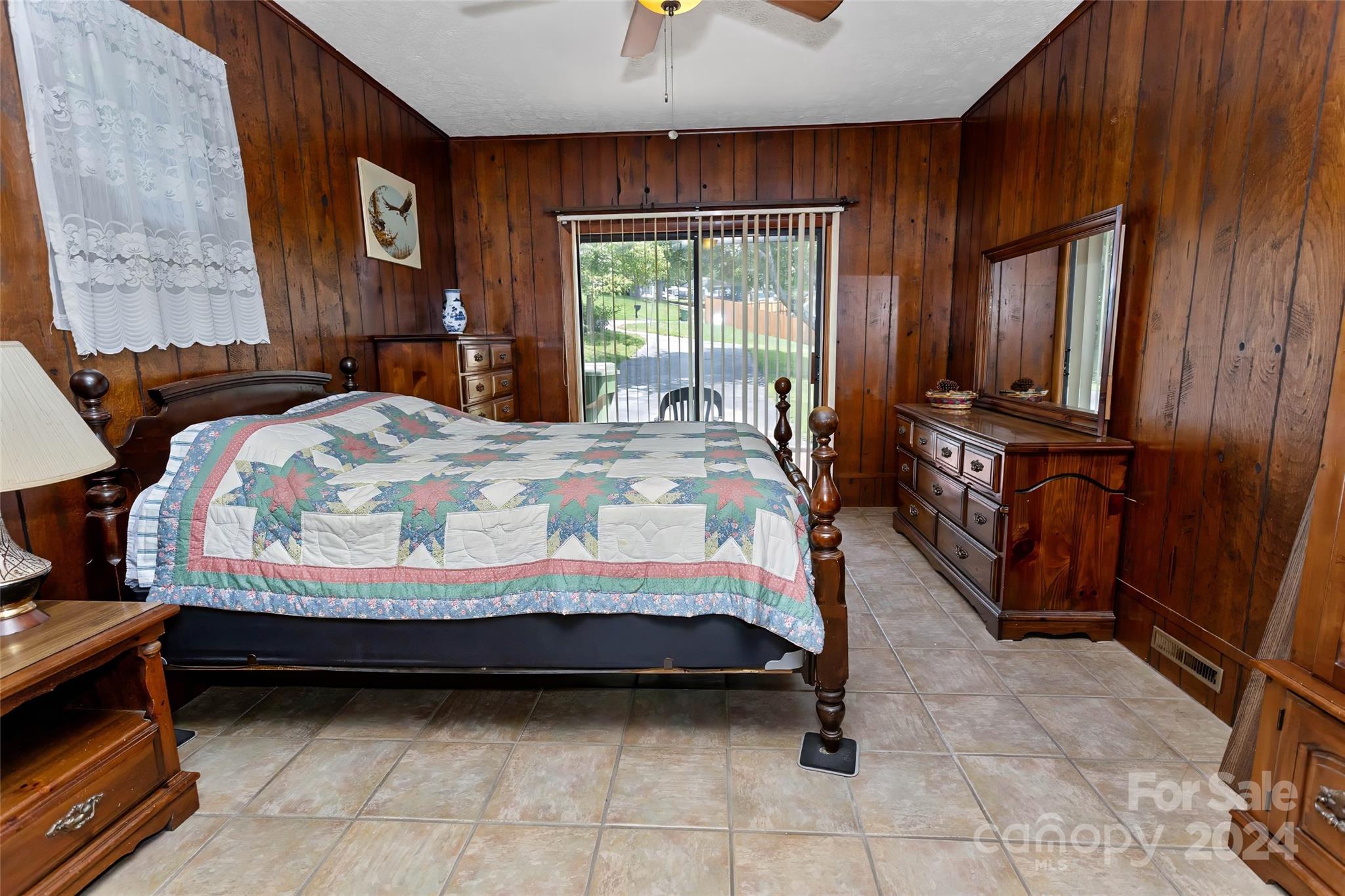 45 Cub Road Asheville, NC 28806 - Photo 15 of 46 a bed sitting in a bedroom next to a window