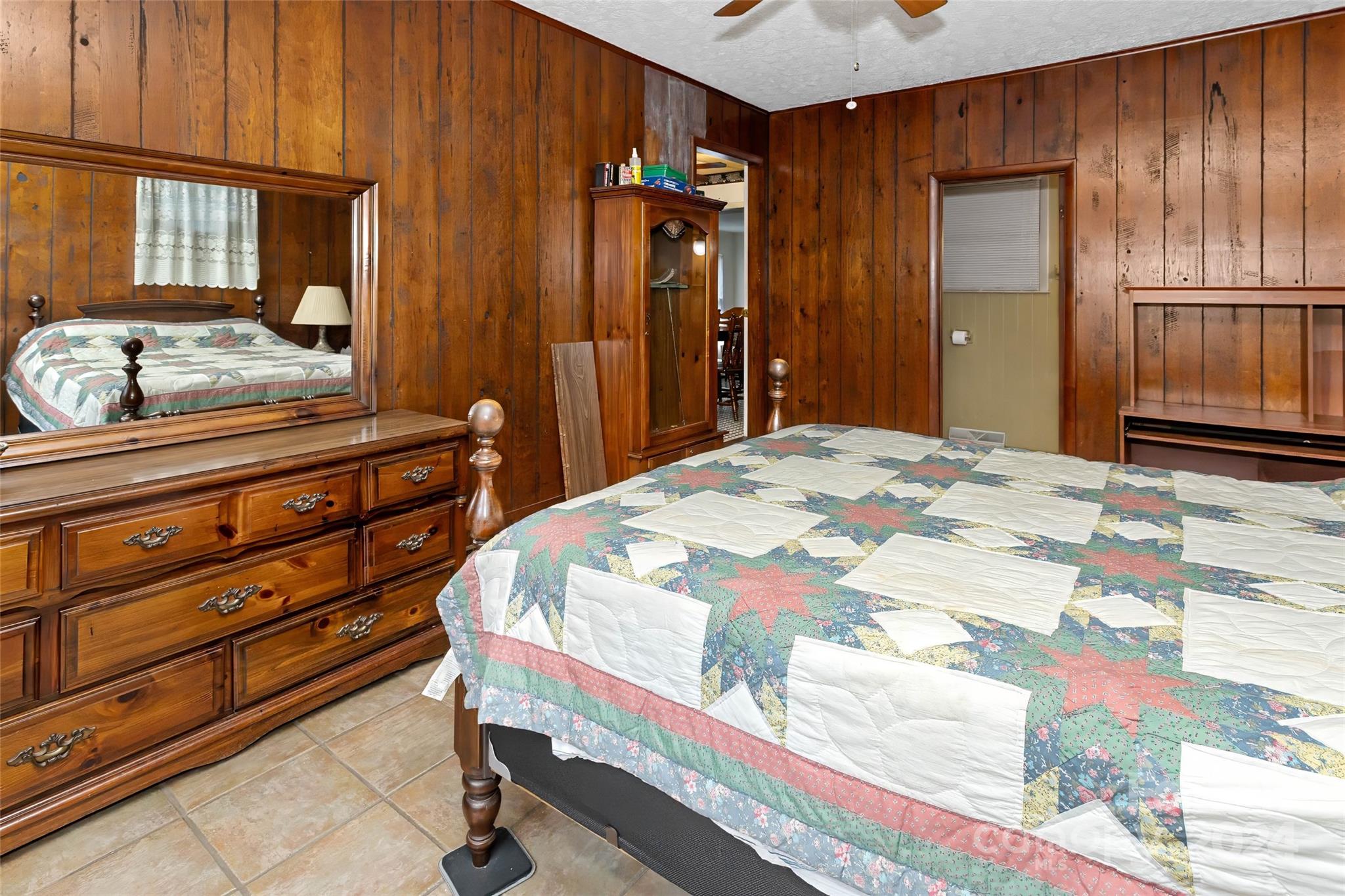 45 Cub Road Asheville, NC 28806 - Photo 17 of 46 a bedroom with a bed and a dresser