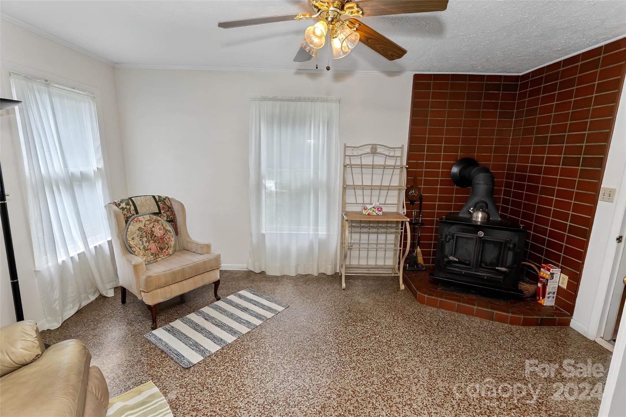 45 Cub Road Asheville, NC 28806 - Photo 20 of 46 a living room with furniture and a flat screen tv