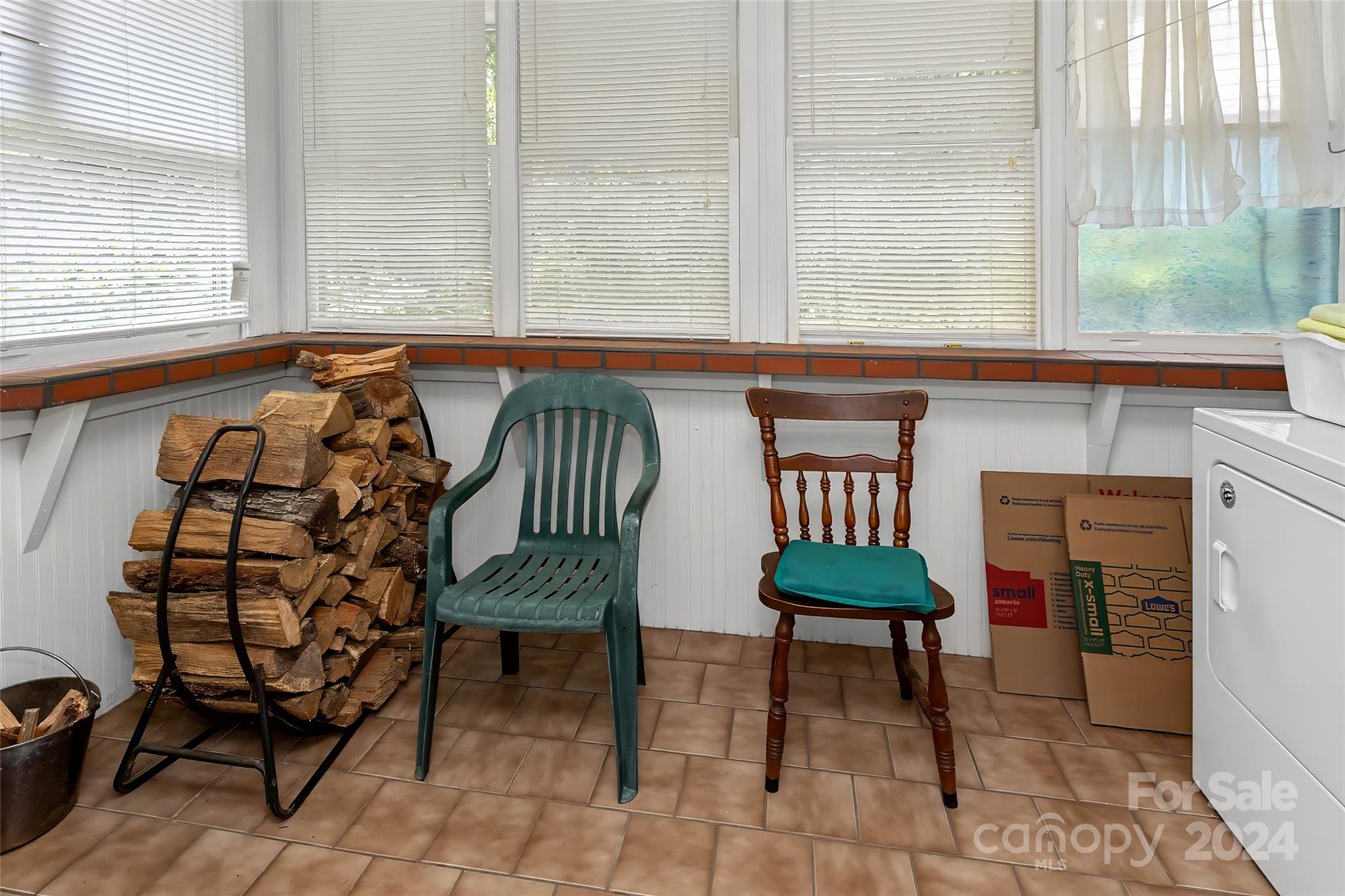 45 Cub Road Asheville, NC 28806 - Photo 23 of 46 a view of a room that has a table and a chair in it