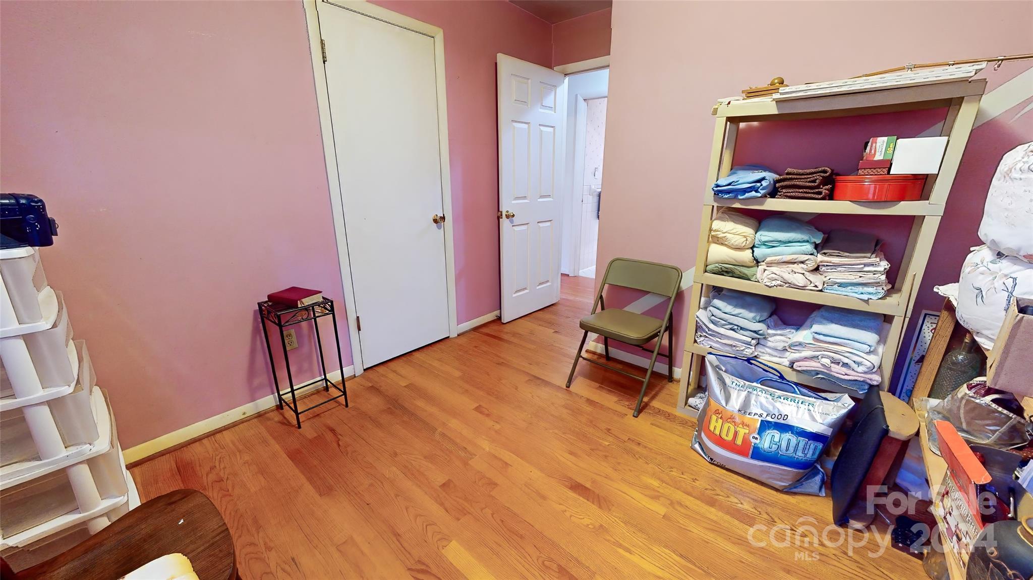 45 Cub Road Asheville, NC 28806 - Photo 29 of 46 a room with furniture and a book shelf