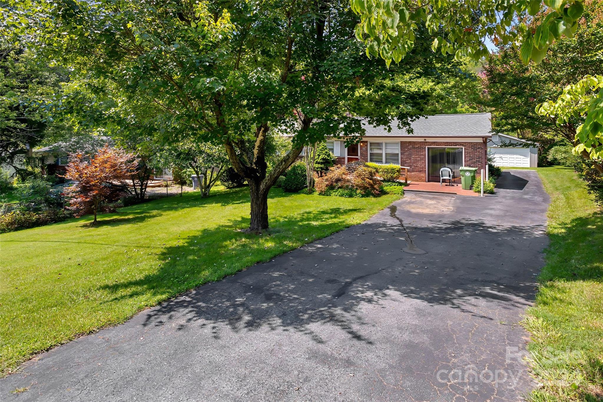 45 Cub Road Asheville, NC 28806 - Photo 3 of 46 a front view of a house with garden