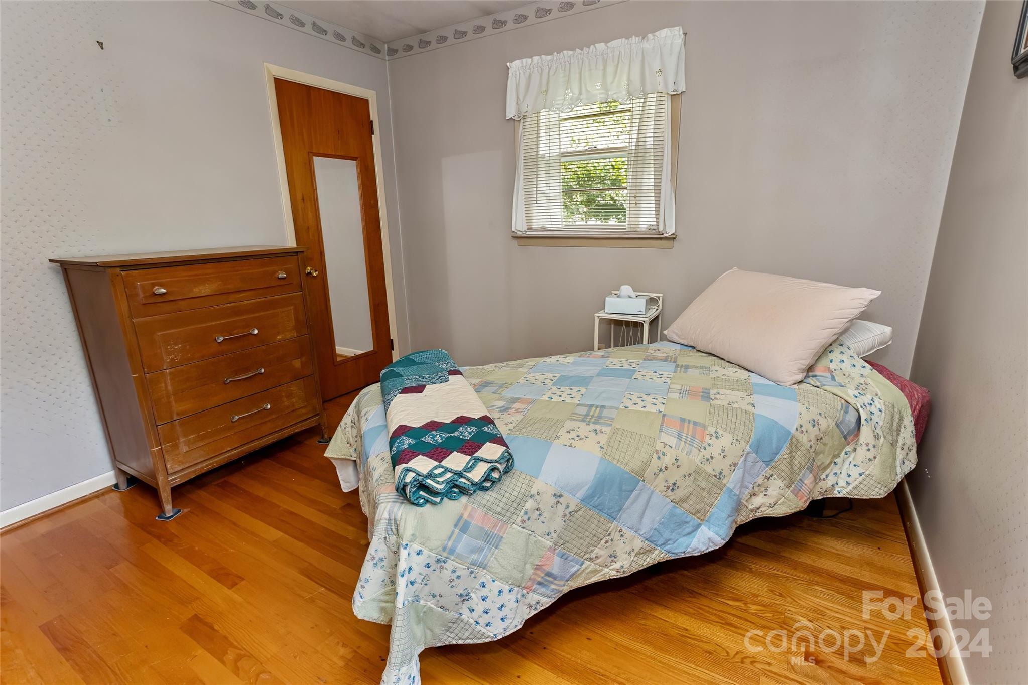 45 Cub Road Asheville, NC 28806 - Photo 31 of 46 a bedroom with bed and a window