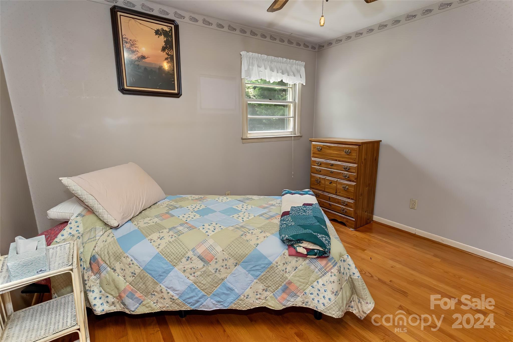 45 Cub Road Asheville, NC 28806 - Photo 32 of 46 a bedroom with a bed and a window