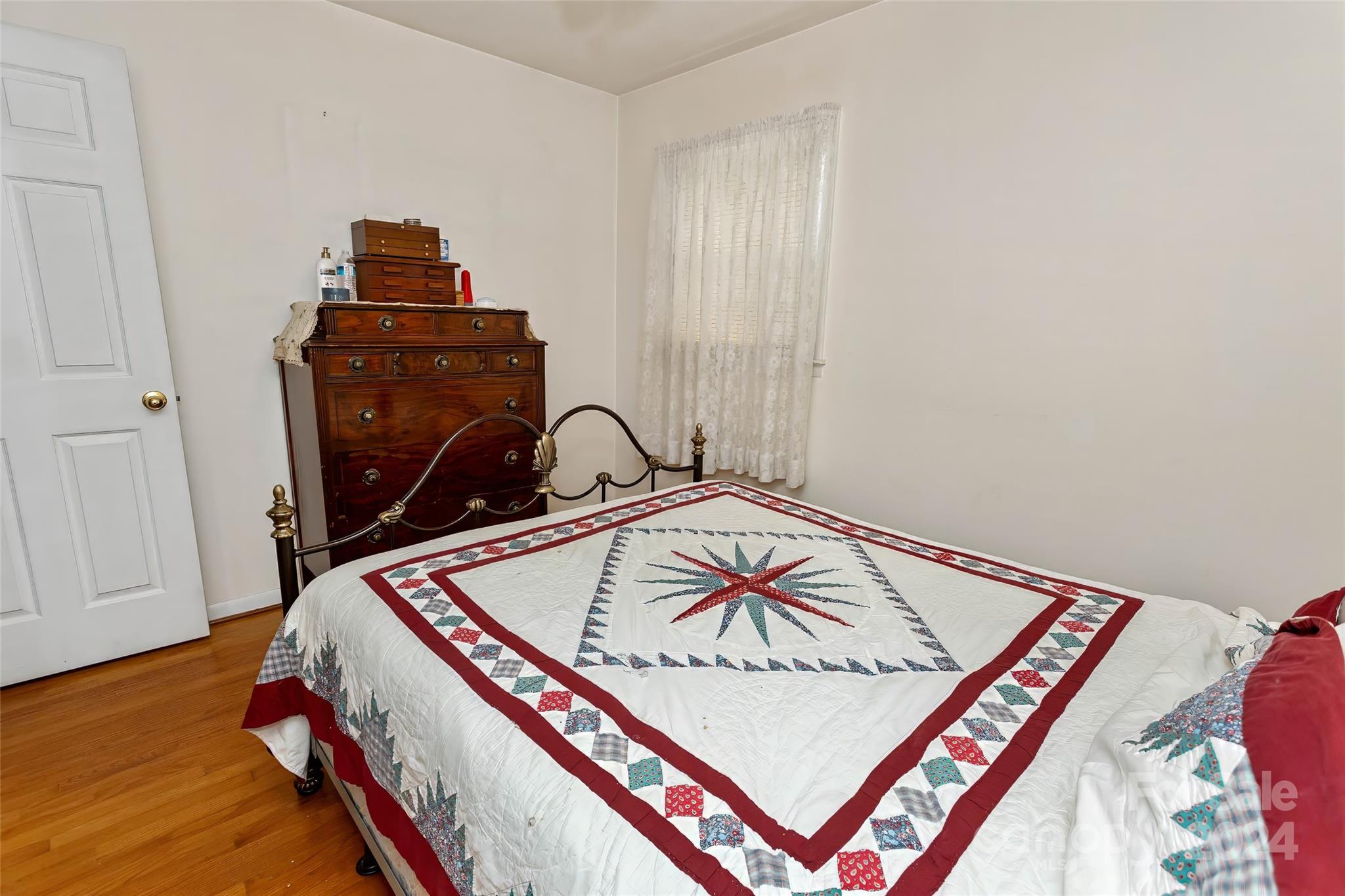 45 Cub Road Asheville, NC 28806 - Photo 34 of 46 a bedroom with bed and a window