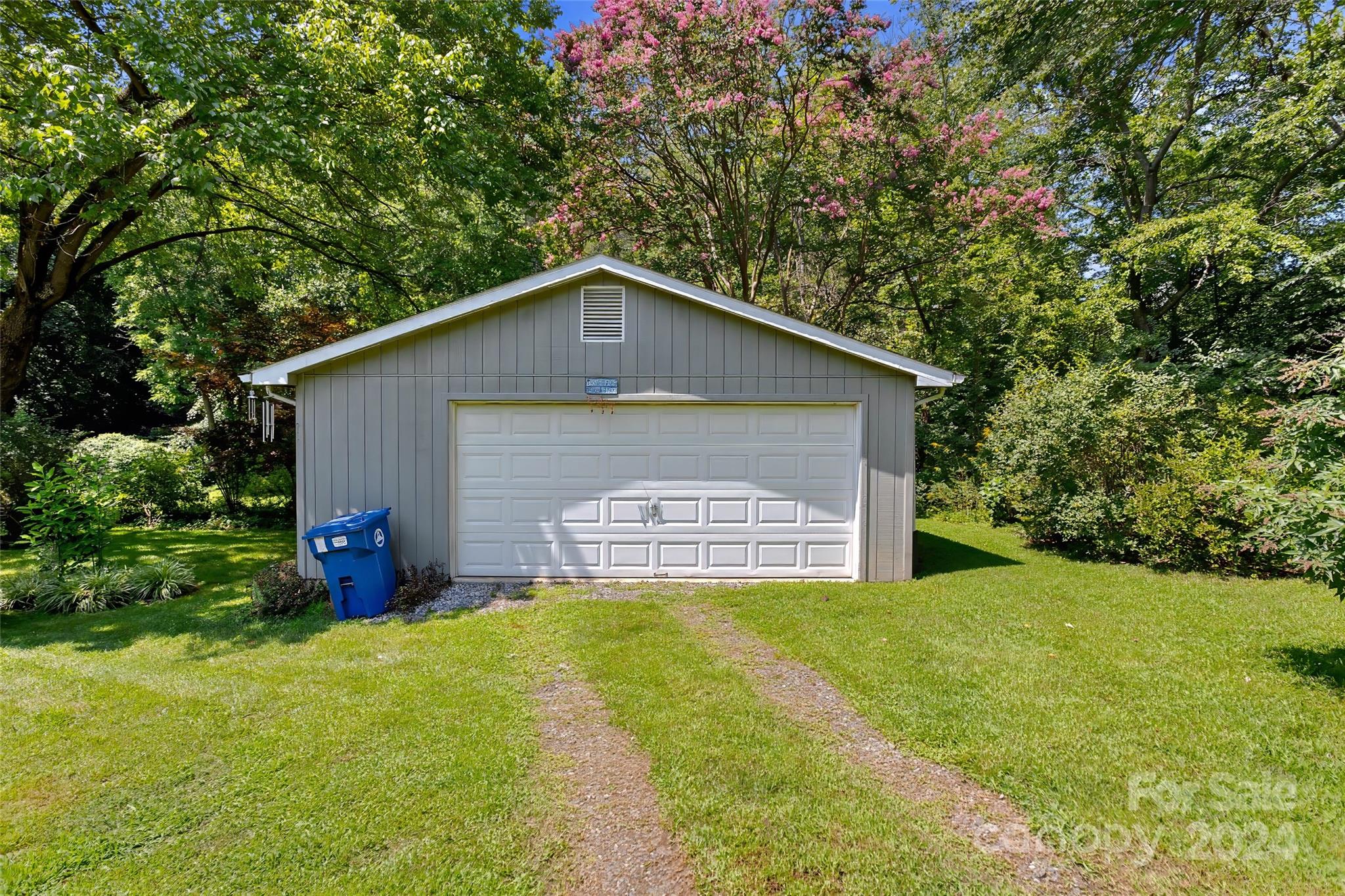 45 Cub Road Asheville, NC 28806 - Photo 41 of 46 a view of a house with a yard and garage