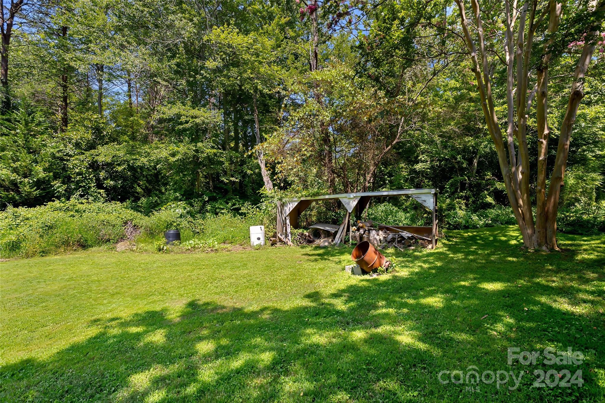45 Cub Road Asheville, NC 28806 - Photo 45 of 46 a view of a backyard with swimming pool