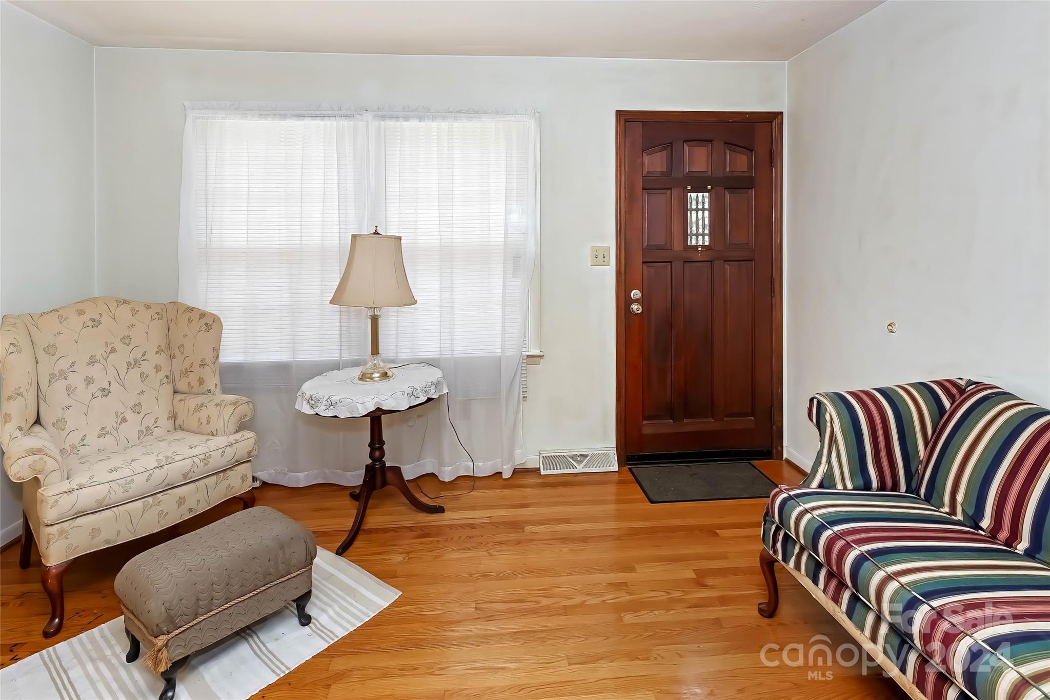 45 Cub Road Asheville, NC 28806 - Photo 5 of 46 a bedroom with a bed and a couch