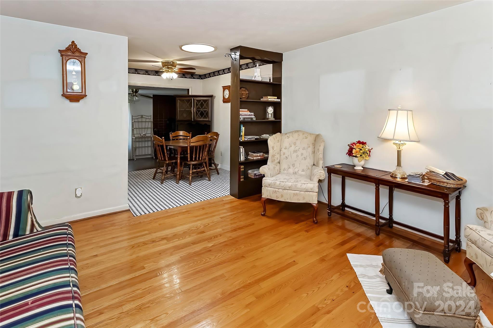 45 Cub Road Asheville, NC 28806 - Photo 7 of 46 a bedroom with furniture and a wooden floor