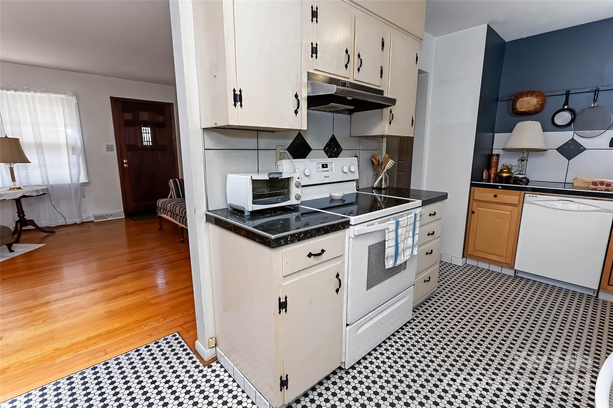 45 Cub Road Asheville, NC 28806 - Photo 10 of 46 a kitchen with stainless steel appliances a sink stove and cabinets