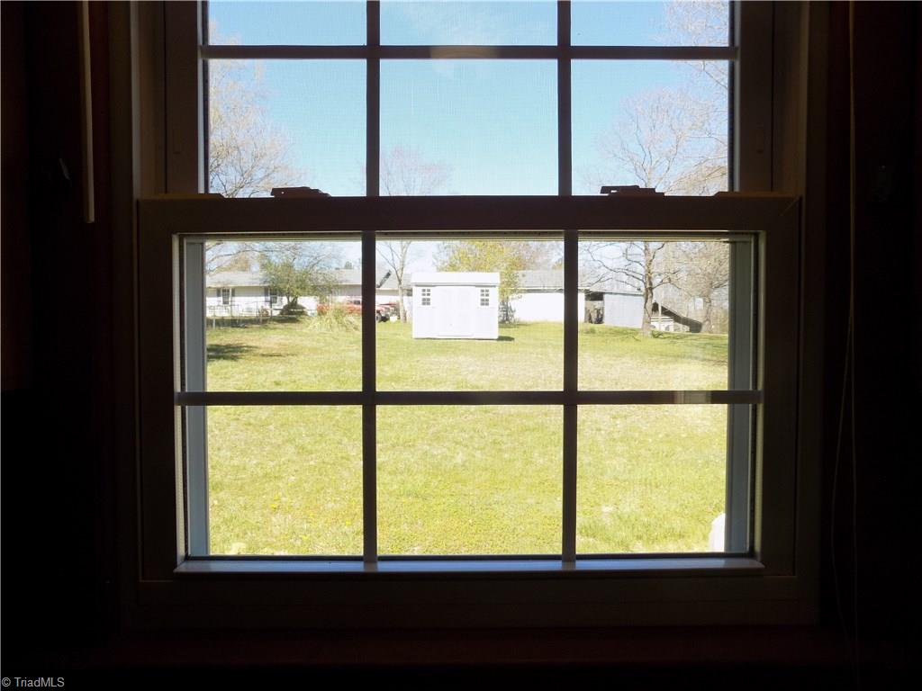 3104 Tyro Road Lexington, NC 27295 - Photo 12 of 28 Backyard view right through the kitchen window!