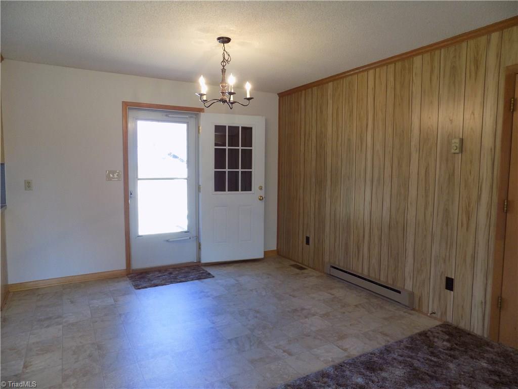 3104 Tyro Road Lexington, NC 27295 - Photo 13 of 28 Breakfast/dining area with a door to the deck.