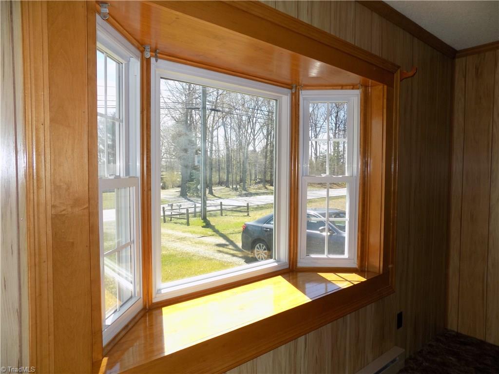 3104 Tyro Road Lexington, NC 27295 - Photo 15 of 28 Graceful bay window to let the sunlight in. Perfect for a bench cushion or plant area.