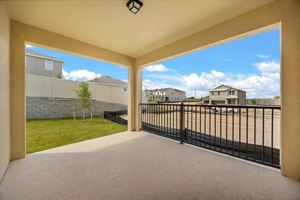 a view of a house with a yard and garage