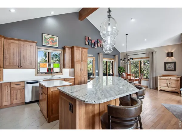 a room with sink and cabinets