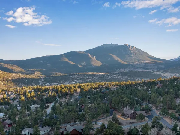 a view of a house with a mountain