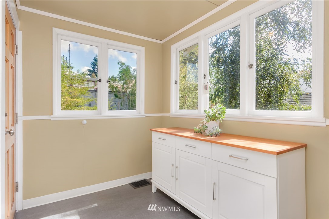3926 Midvale Avenue North Seattle, WA 98103 - Photo 13 of 25 a bathroom with a sink and a window