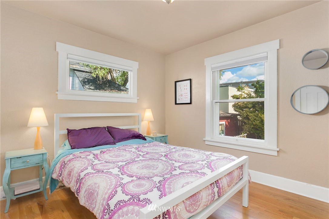 3926 Midvale Avenue North Seattle, WA 98103 - Photo 14 of 25 a bedroom with a bed and a window