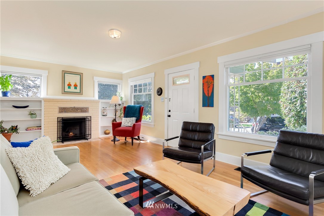 3926 Midvale Avenue North Seattle, WA 98103 - Photo 3 of 25 a living room with furniture fireplace and window