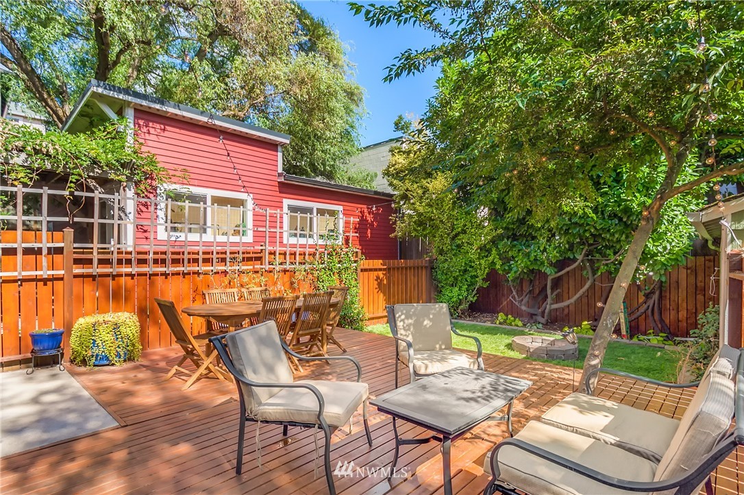 3926 Midvale Avenue North Seattle, WA 98103 - Photo 22 of 25 a view of a chair and table in backyard