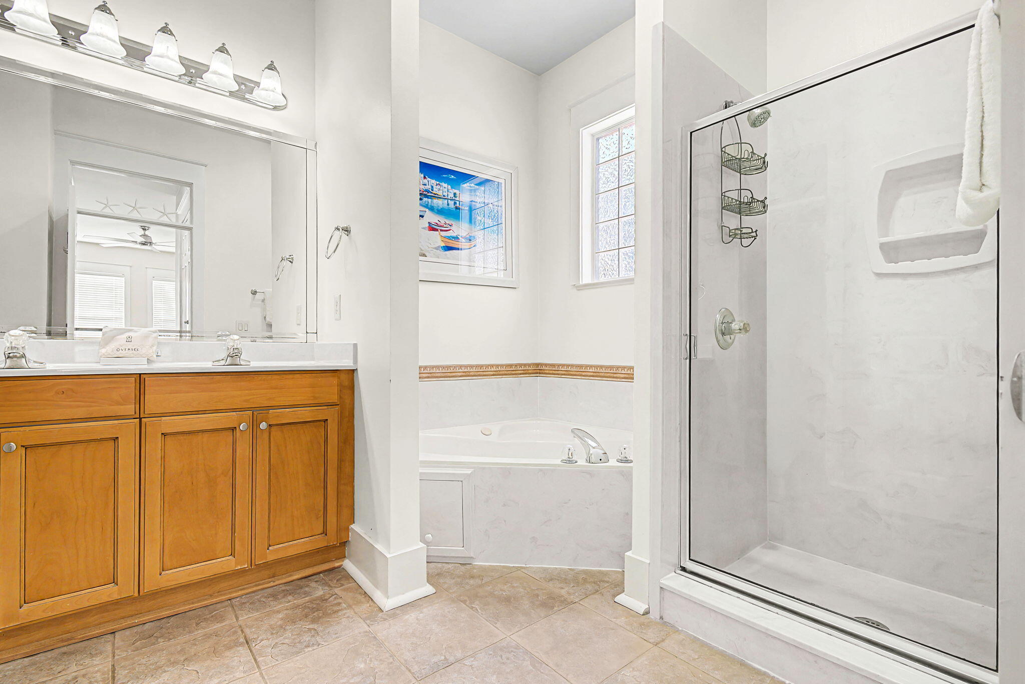 306 Beach Bike Way Inlet Beach, FL 32461 - Photo 15 of 33 a bathroom with a granite countertop sink a mirror a bathtub and shower