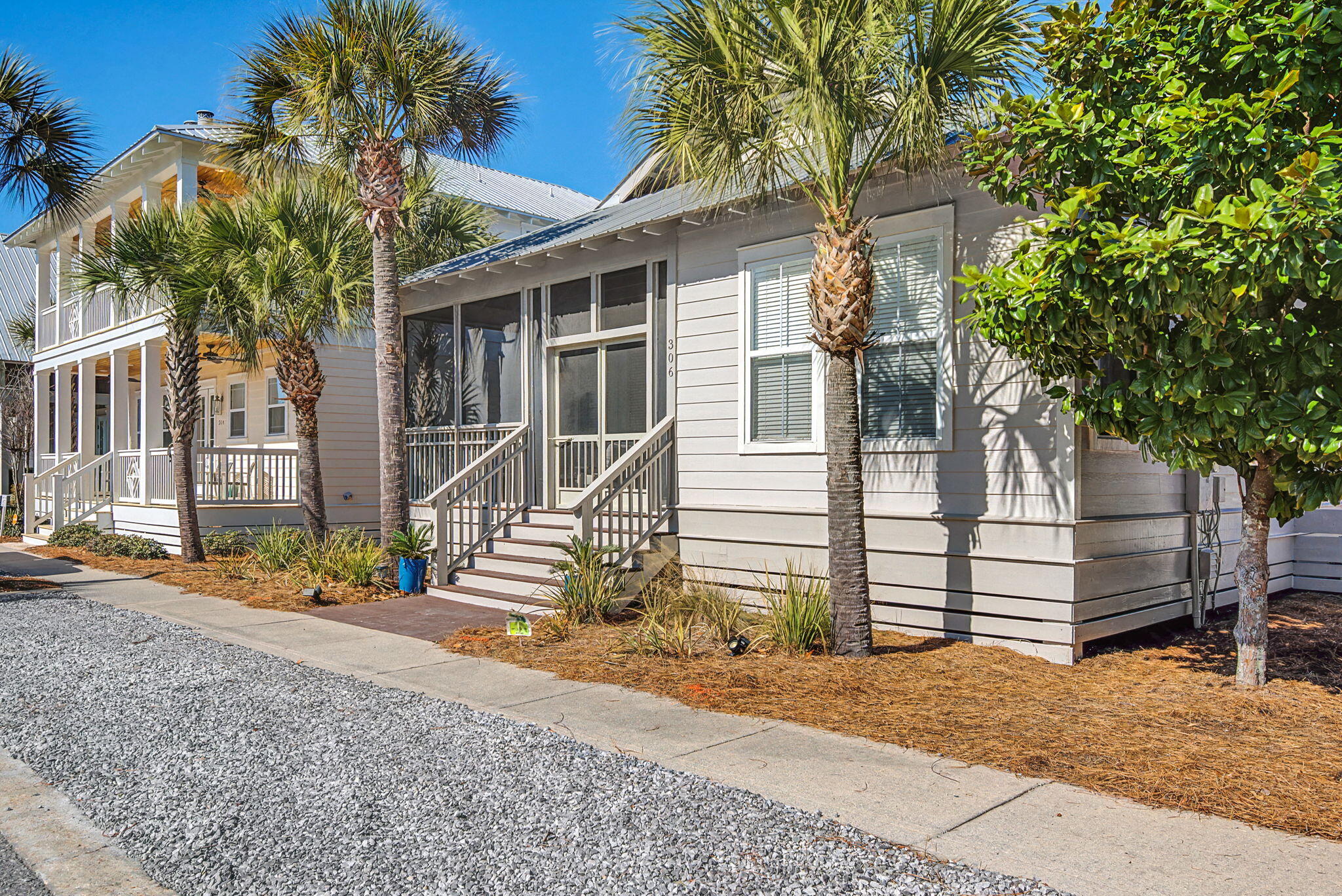 306 Beach Bike Way Inlet Beach, FL 32461 - Photo 2 of 33 a front view of a house with a yard
