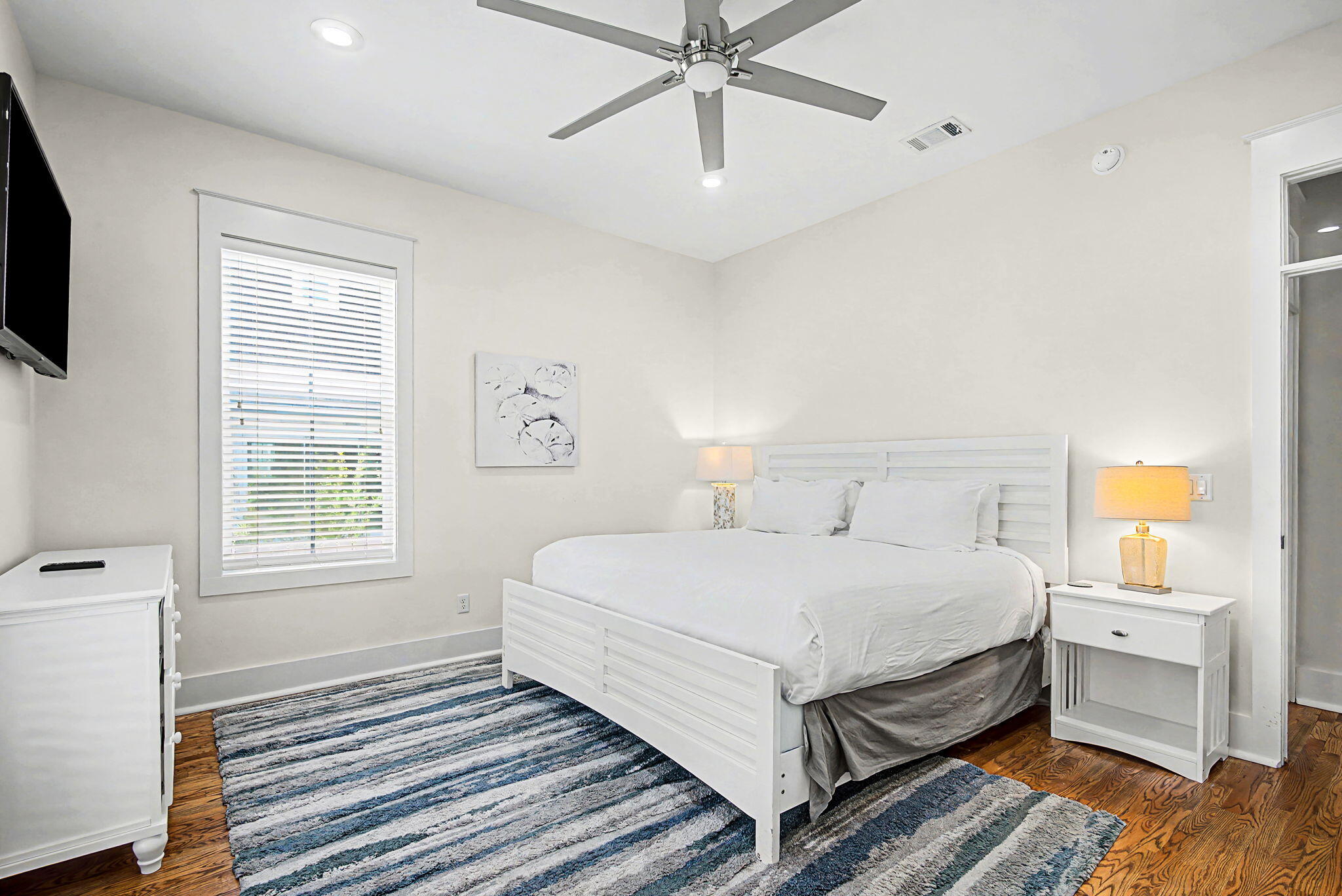 306 Beach Bike Way Inlet Beach, FL 32461 - Photo 22 of 33 a bedroom with a bed and a flat screen tv