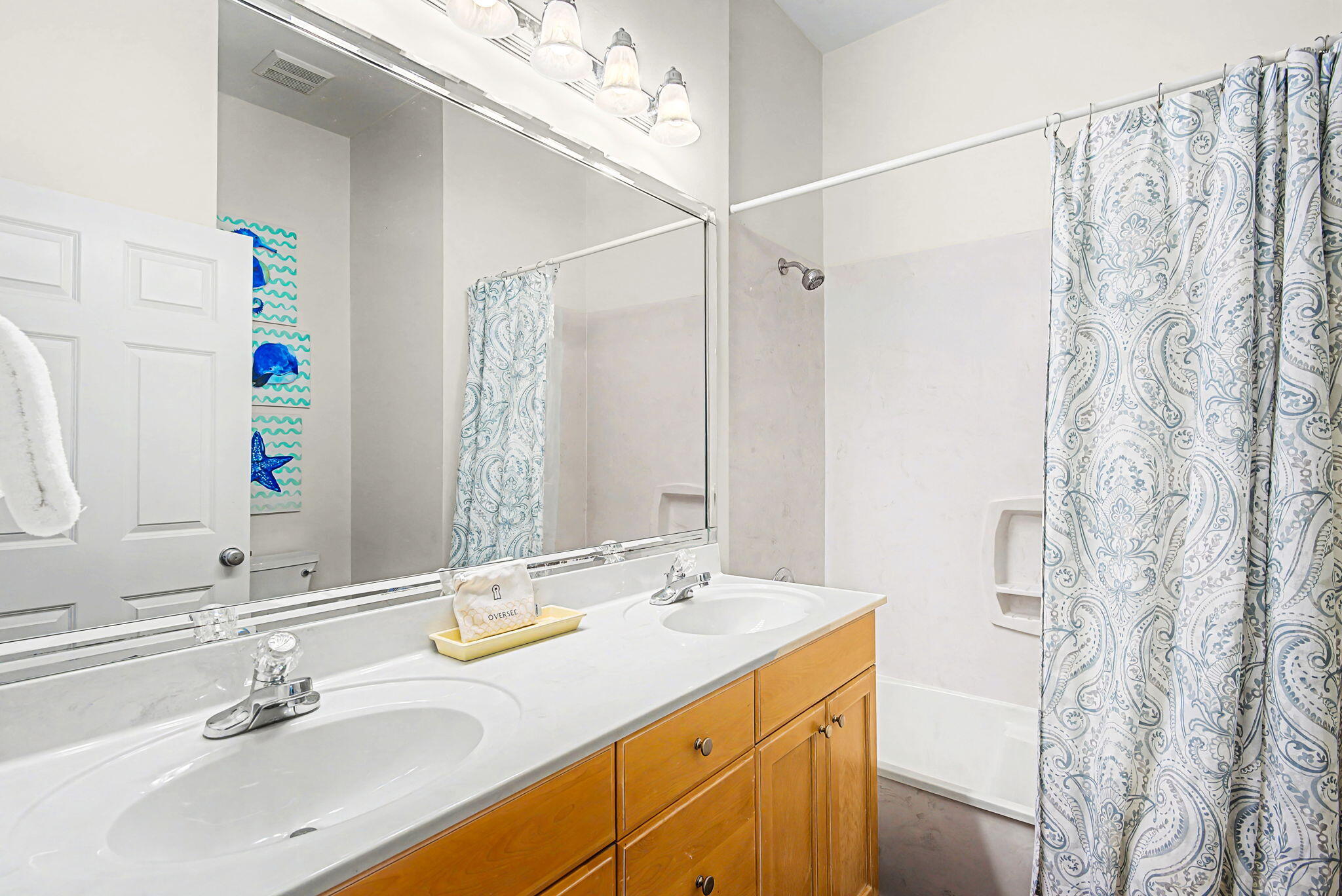 306 Beach Bike Way Inlet Beach, FL 32461 - Photo 24 of 33 a bathroom with a sink double vanity and a mirror