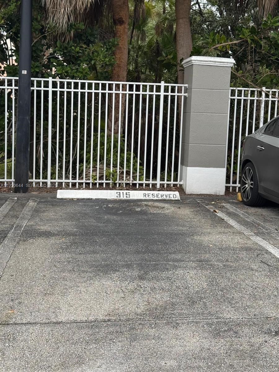 11033 Legacy Boulevard, Unit 302 Palm Beach Gardens, FL 33410 - Photo 24 of 28 a view of a door of a house