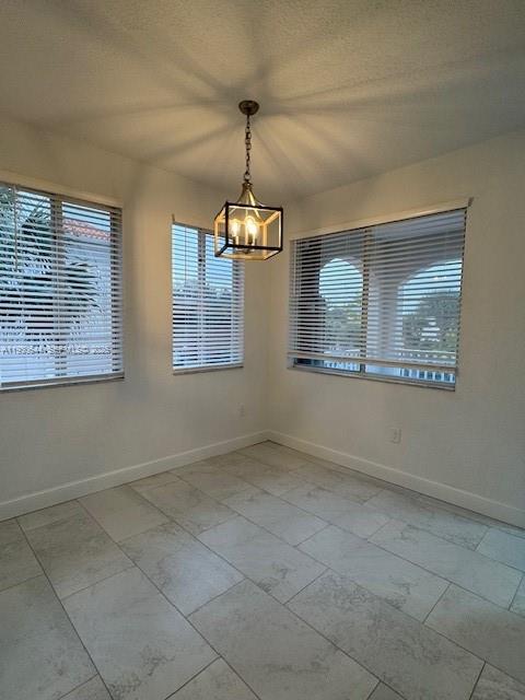 11033 Legacy Boulevard, Unit 302 Palm Beach Gardens, FL 33410 - Photo 10 of 28 a view of an empty room with a window