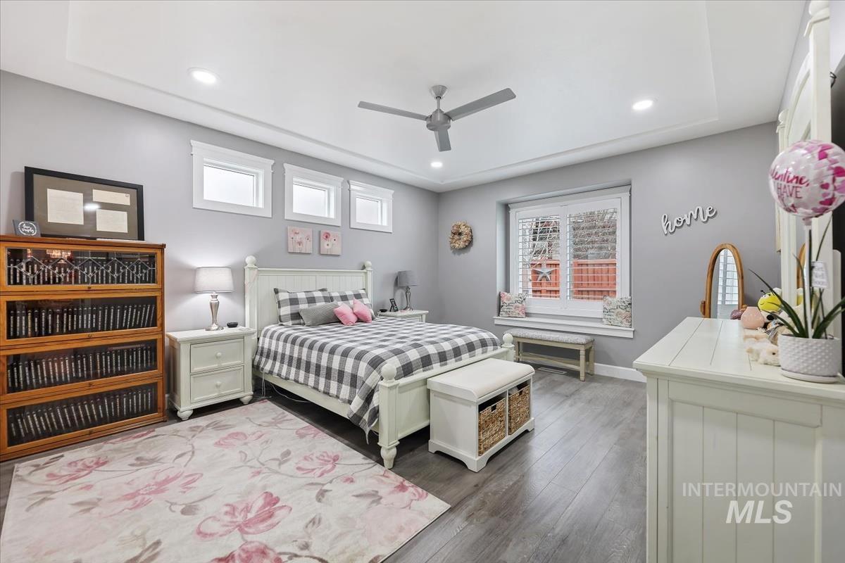 189 South Devon Avenue Star, ID 83669 - Photo 11 of 42 Bedroom with ceiling fan, wood finished floors, and recessed lighting