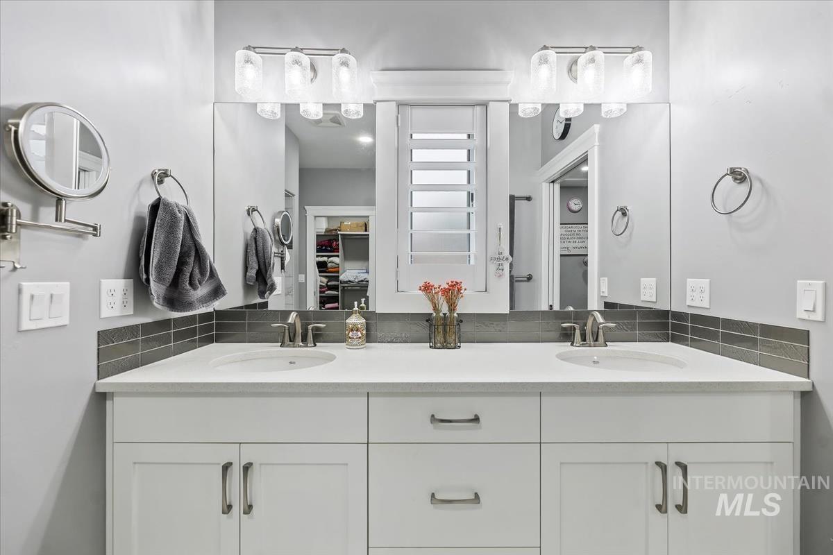 189 South Devon Avenue Star, ID 83669 - Photo 12 of 42 Bathroom featuring double vanity and a spacious closet