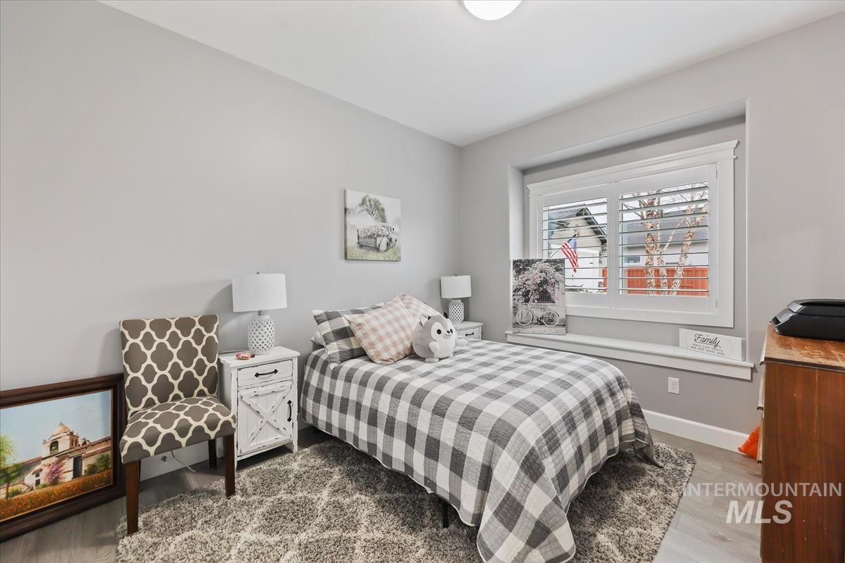 189 South Devon Avenue Star, ID 83669 - Photo 22 of 42 Bedroom featuring wood finished floors and baseboards