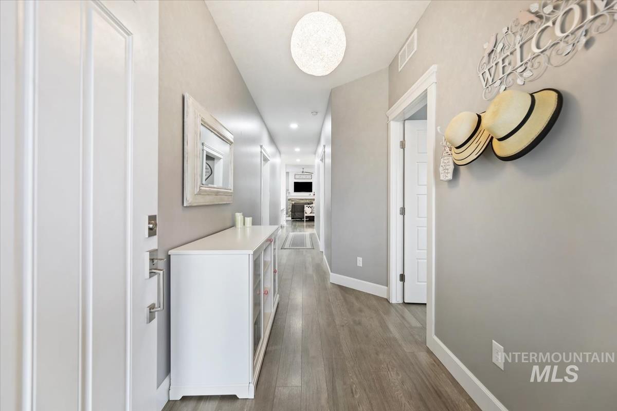 189 South Devon Avenue Star, ID 83669 - Photo 26 of 42 Hall with dark wood-style flooring and recessed lighting