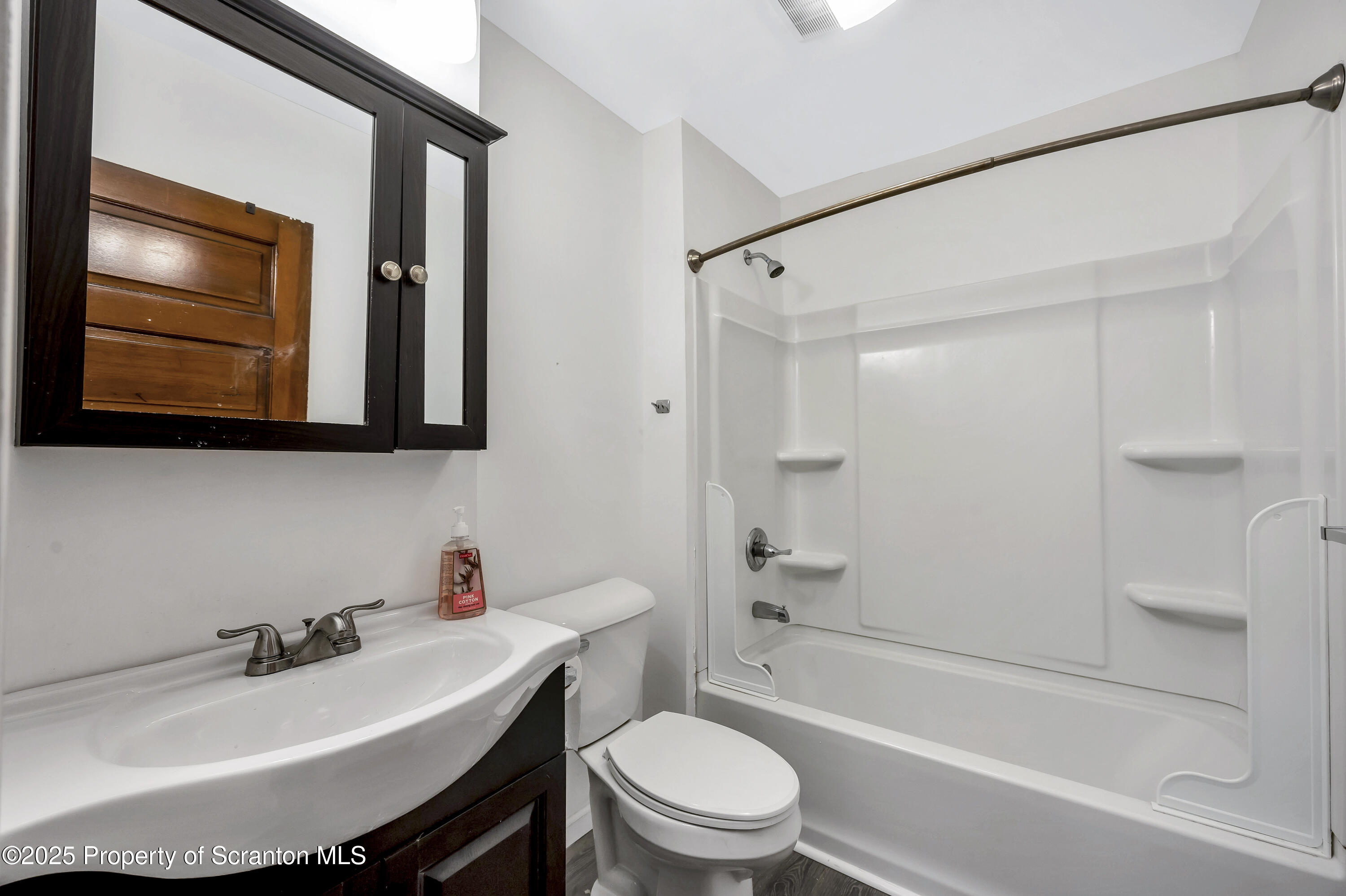 811 Grandview Street Scranton, PA 18509 - Photo 10 of 13 a bathroom with a sink toilet and shower
