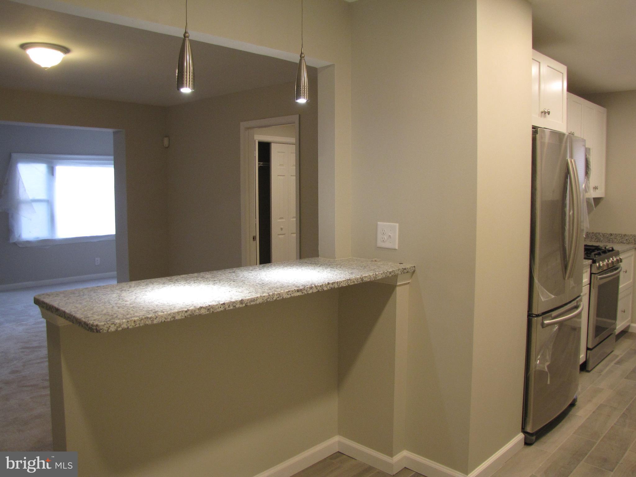 8478 Rugby Road Pasadena, MD 21122 - Photo 8 of 19 eat in dining room or just use this counter!