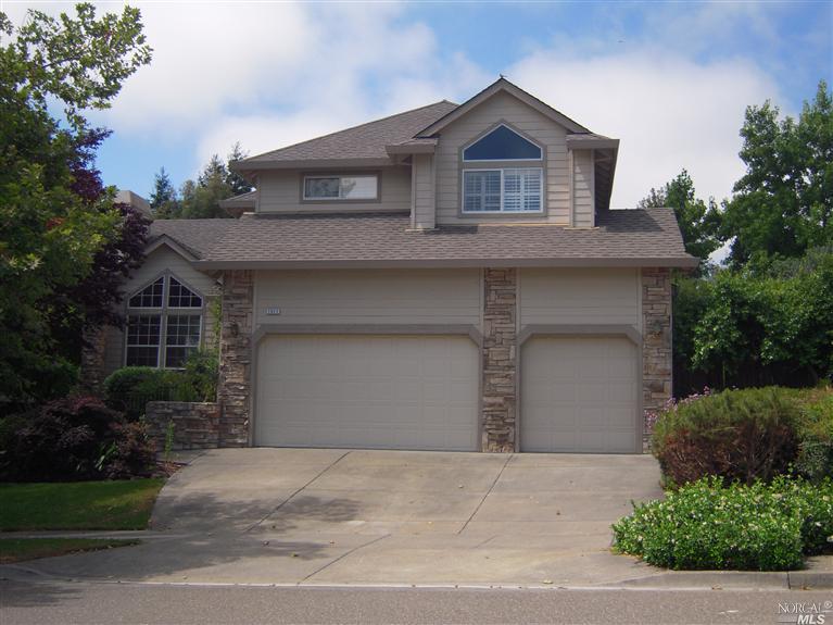 1511 San Ramon Way Santa Rosa, CA 95409 - Photo 1 of 1 a front view of a house with a yard and garage