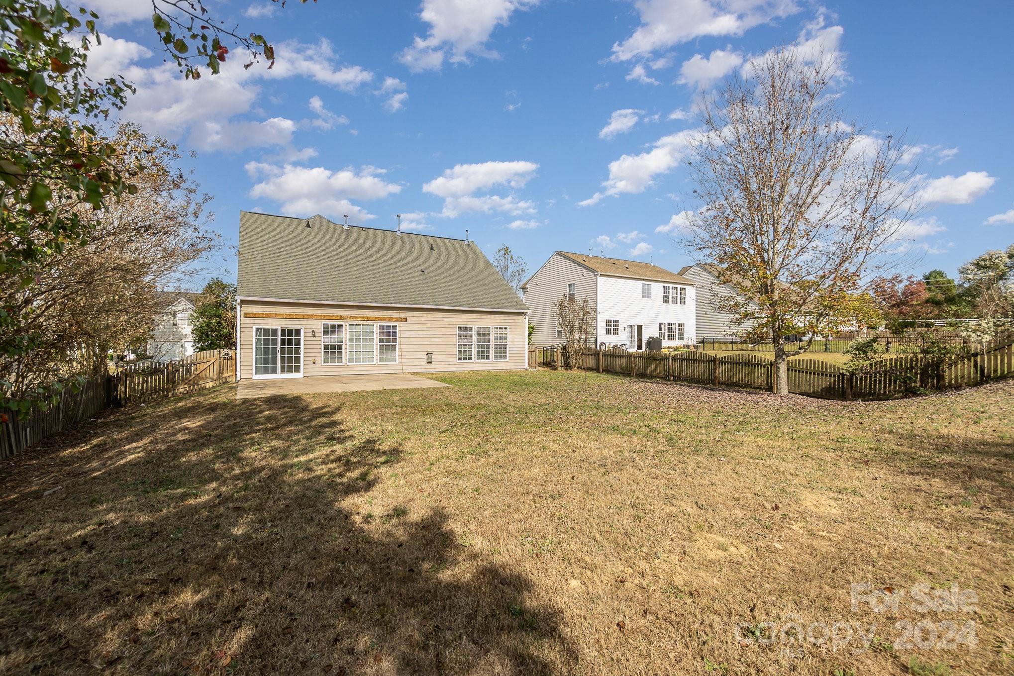 2532 Coltsgate Road Waxhaw, NC 28173 - Photo 18 of 21 a front view of a house with a yard