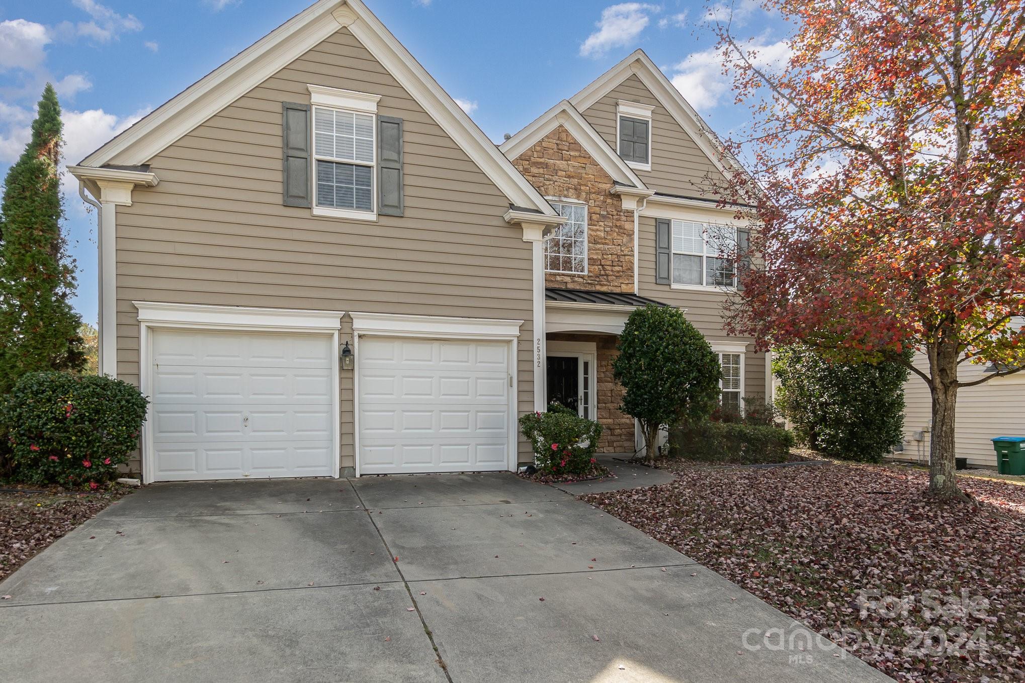 2532 Coltsgate Road Waxhaw, NC 28173 - Photo 2 of 21 a view of house with outdoor space and parking space